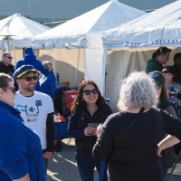 Group of alumni talking to each other